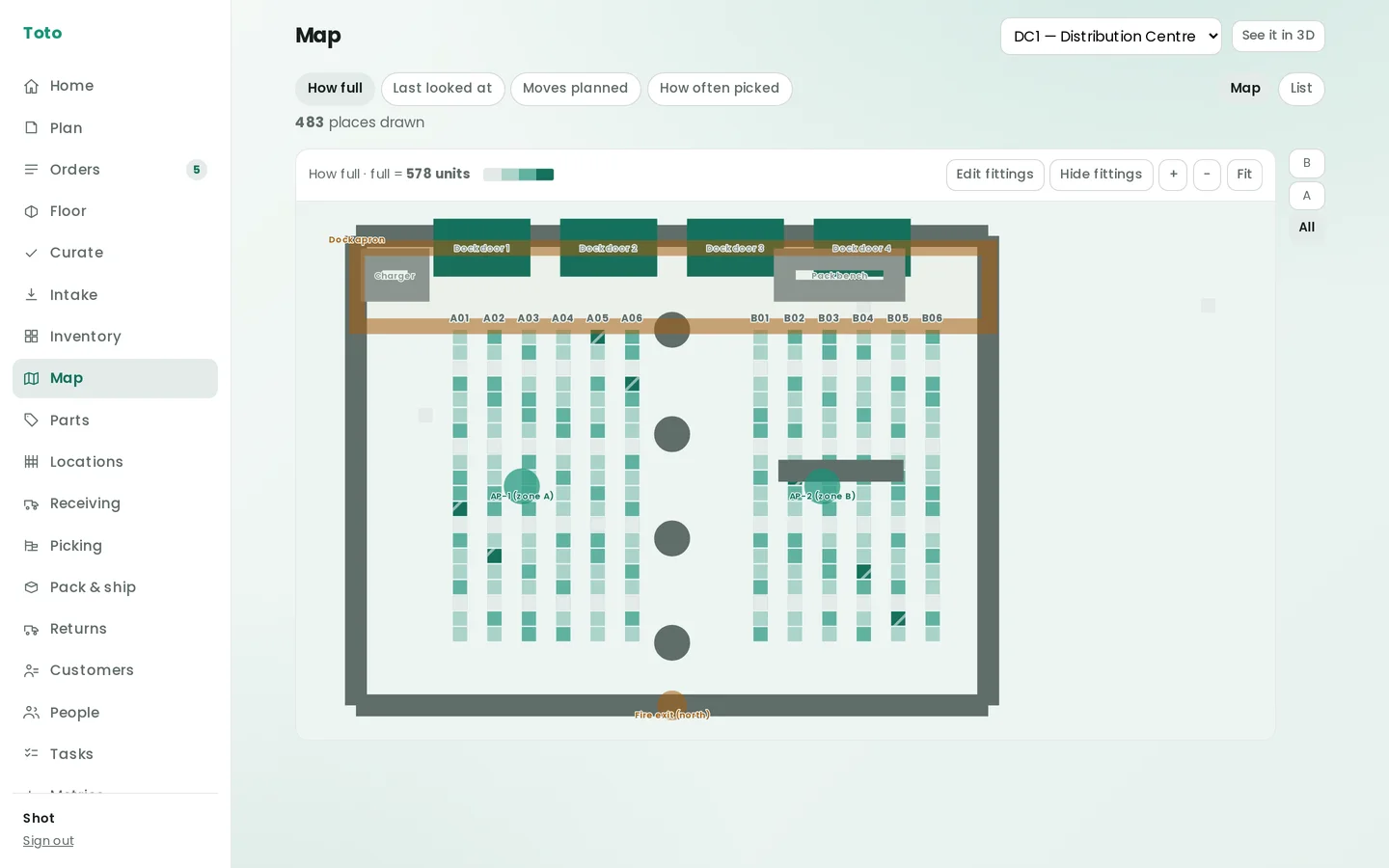 The Map screen: a plan view of Distribution Centre, 483 places drawn, each bin shaded by how full it is, dock doors along the top.